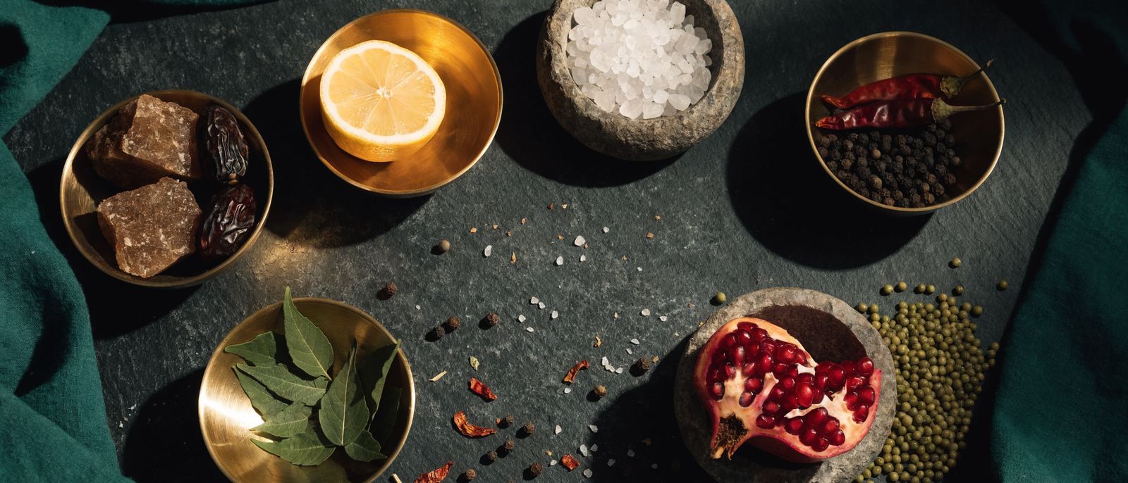 The six tastes laid out in brass bowls